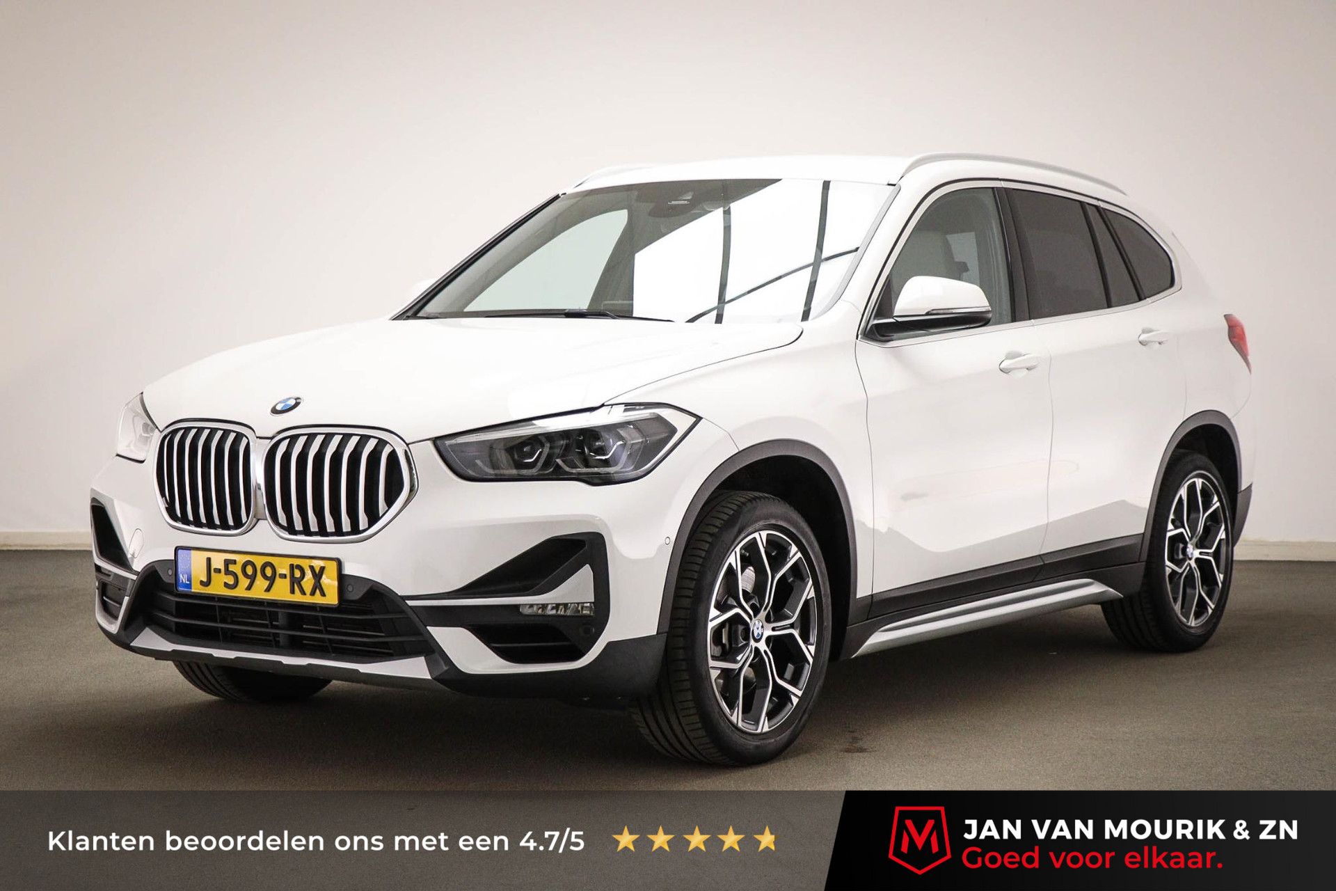 BMW X1 met kenteken J-599-RX – vooraanzicht