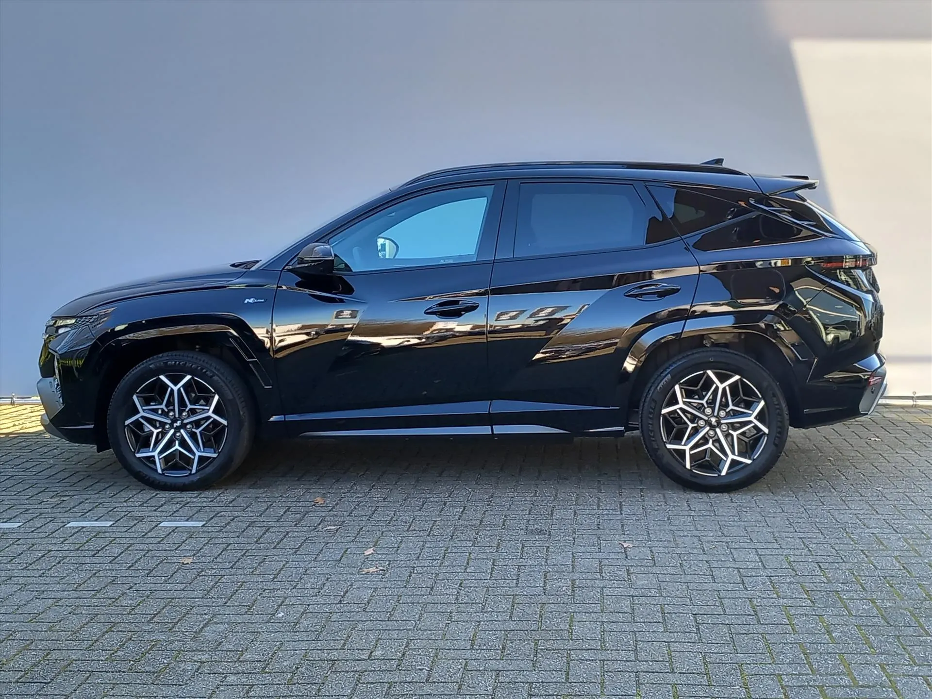 Hyundai Tucson met kenteken 76964 – achteraanzicht