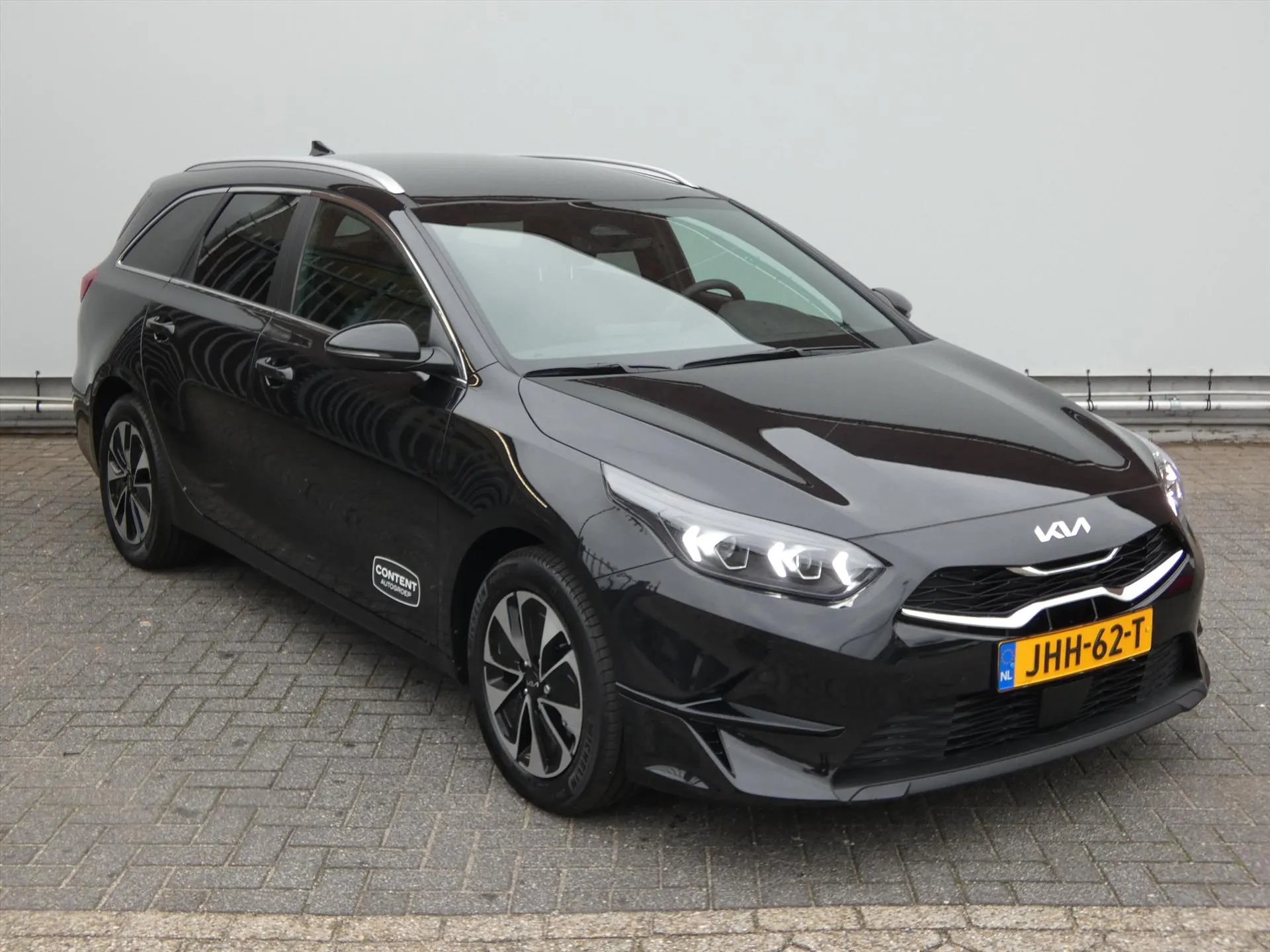 Kia CeedSportswagon met kenteken JHH-62-T – achteraanzicht