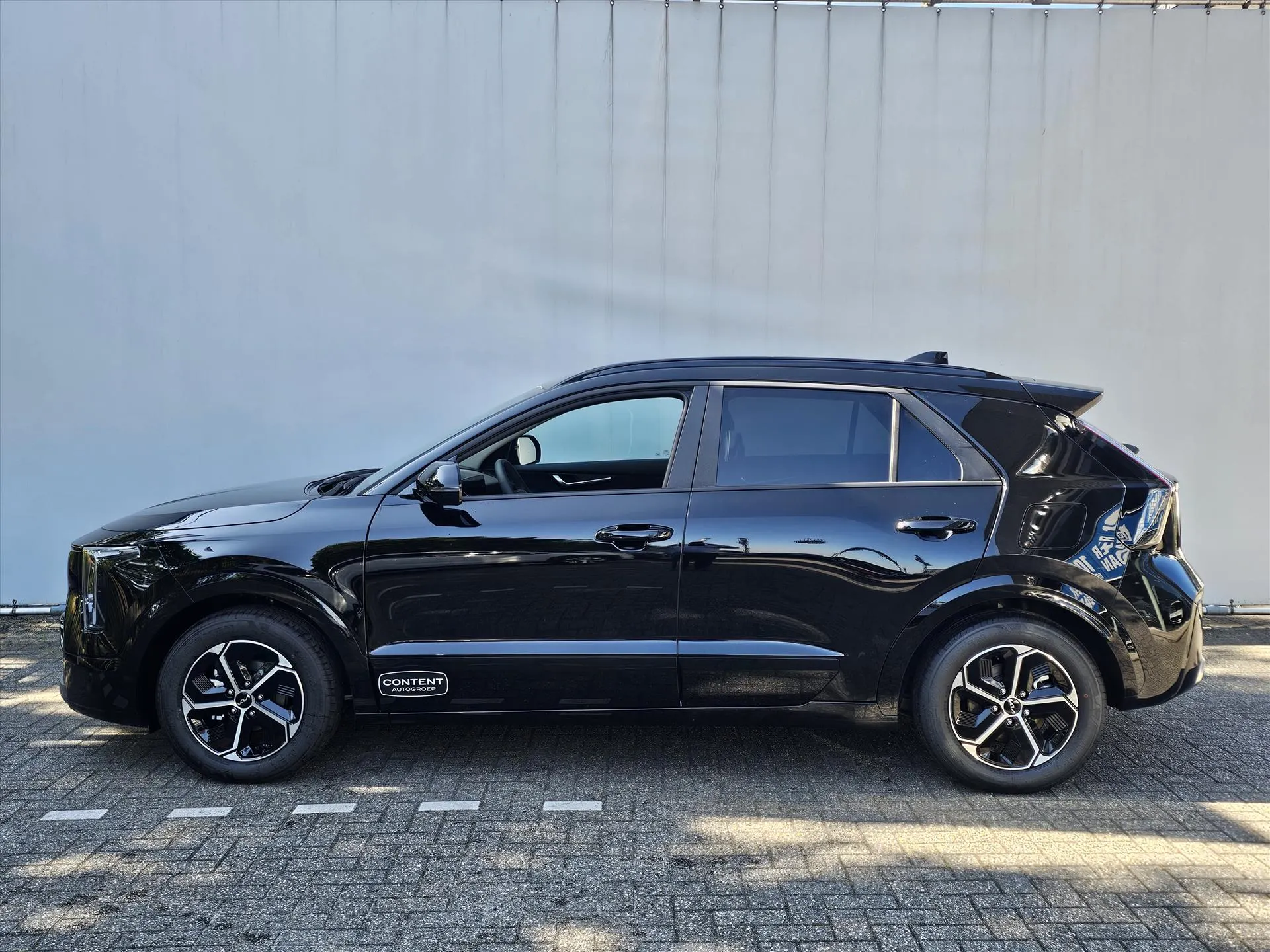 Kia Niro met kenteken KNT-69-H – achteraanzicht