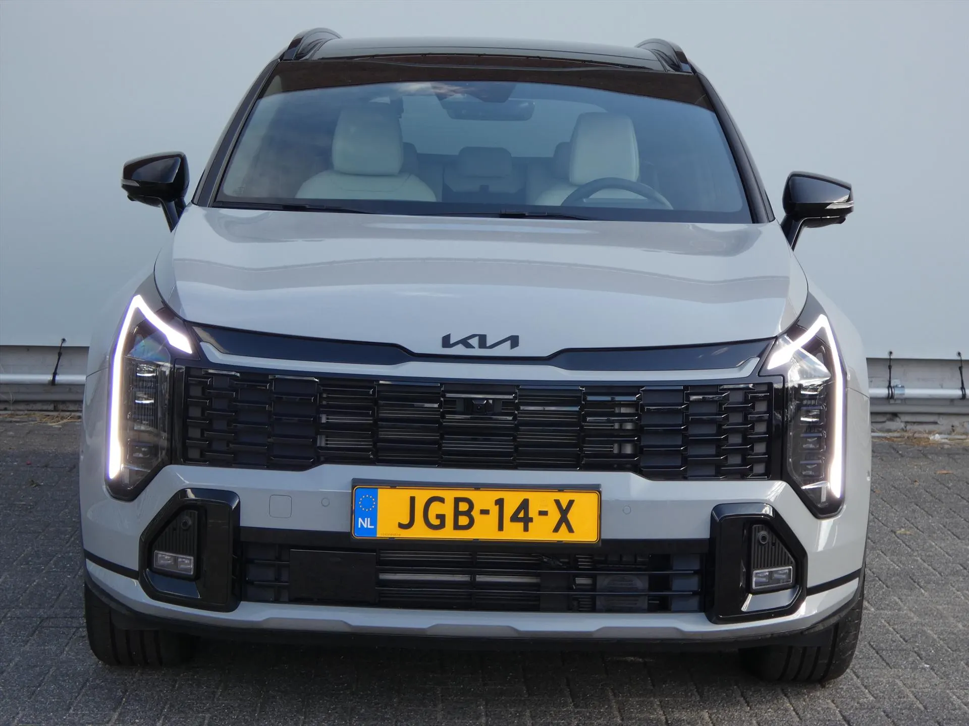 Kia Sportage met kenteken JGB-14-X – achteraanzicht