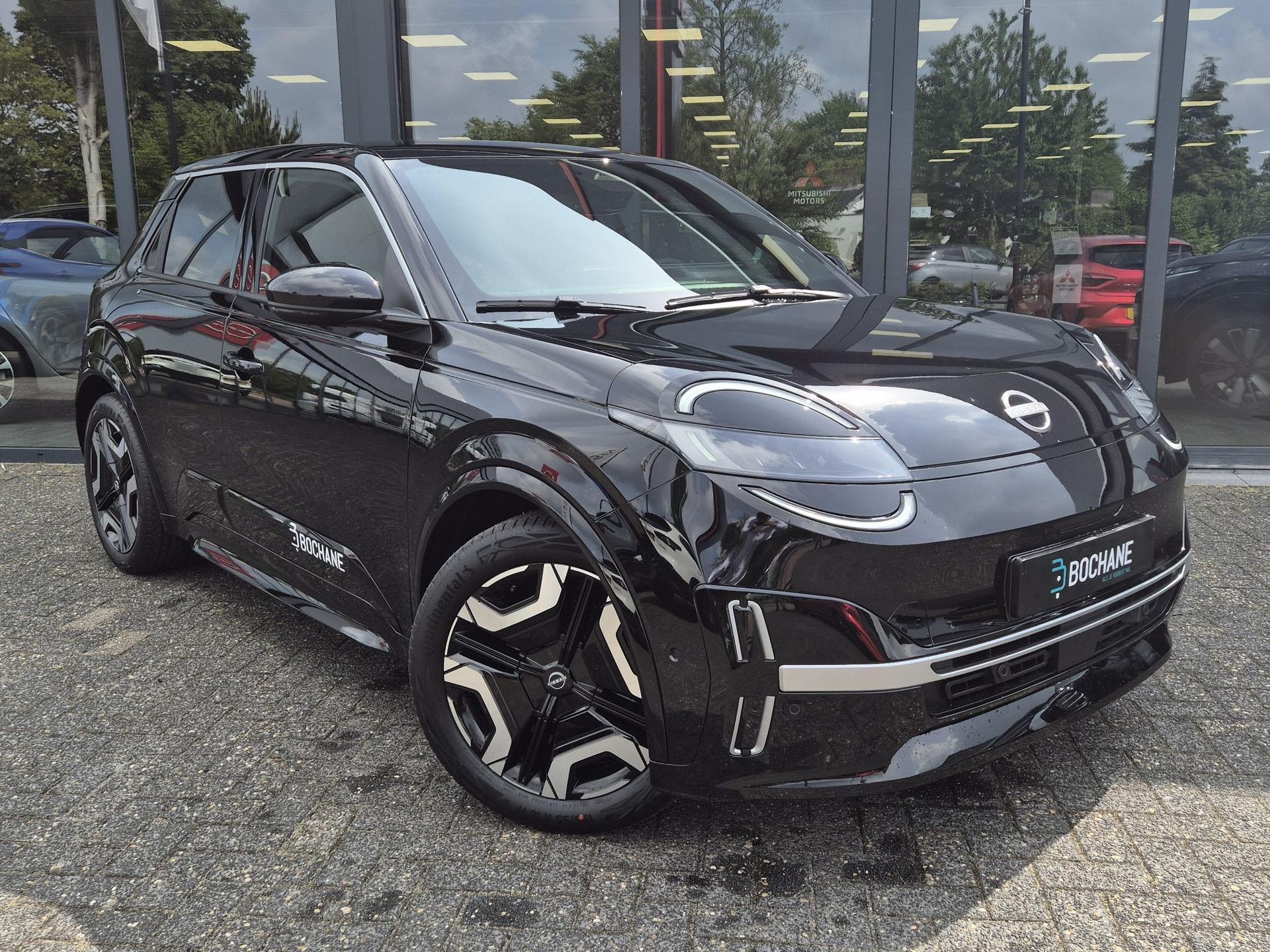 Nissan Micra met kenteken KHR-08-R – detailfoto