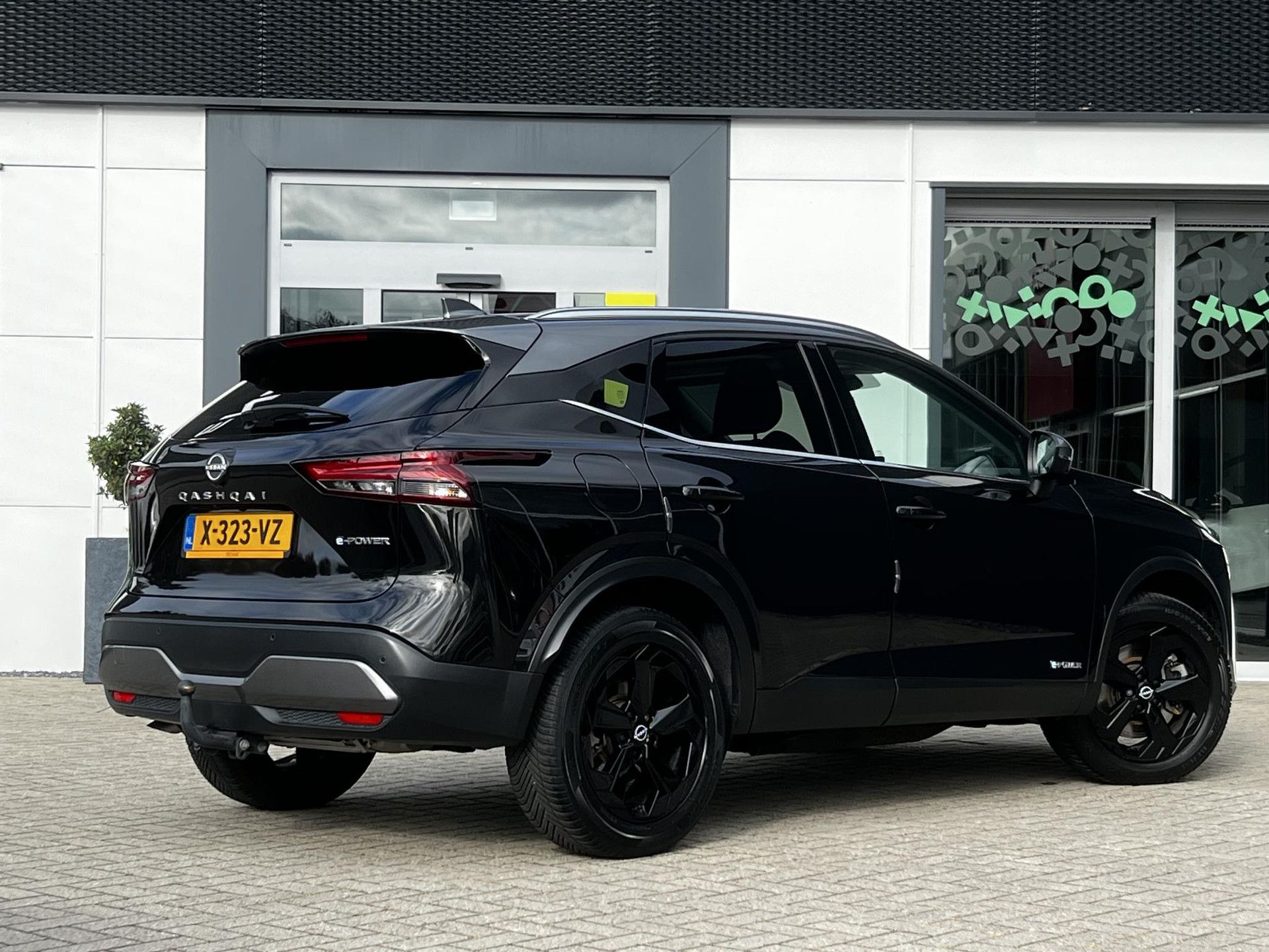 Nissan QASHQAI met kenteken X-323-VZ – achteraanzicht
