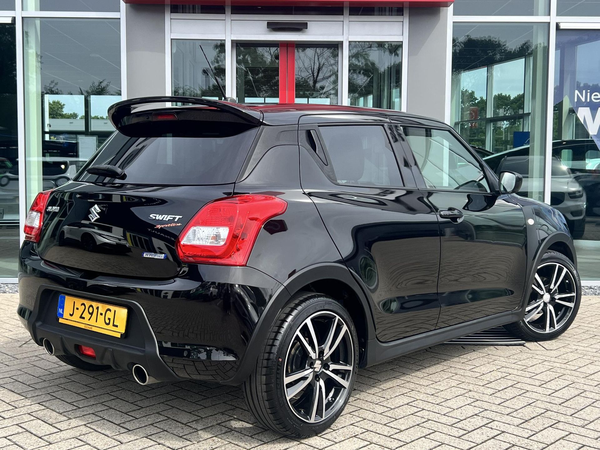 Suzuki Swift met kenteken J-291-GL – achteraanzicht