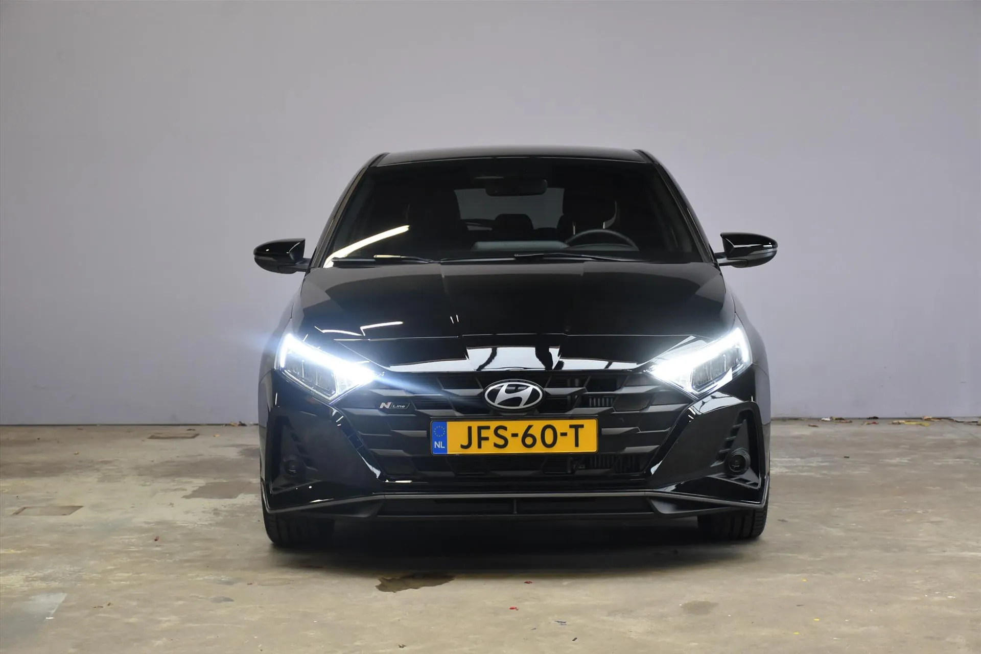 Hyundai i20 met kenteken JFS-60-T – achteraanzicht