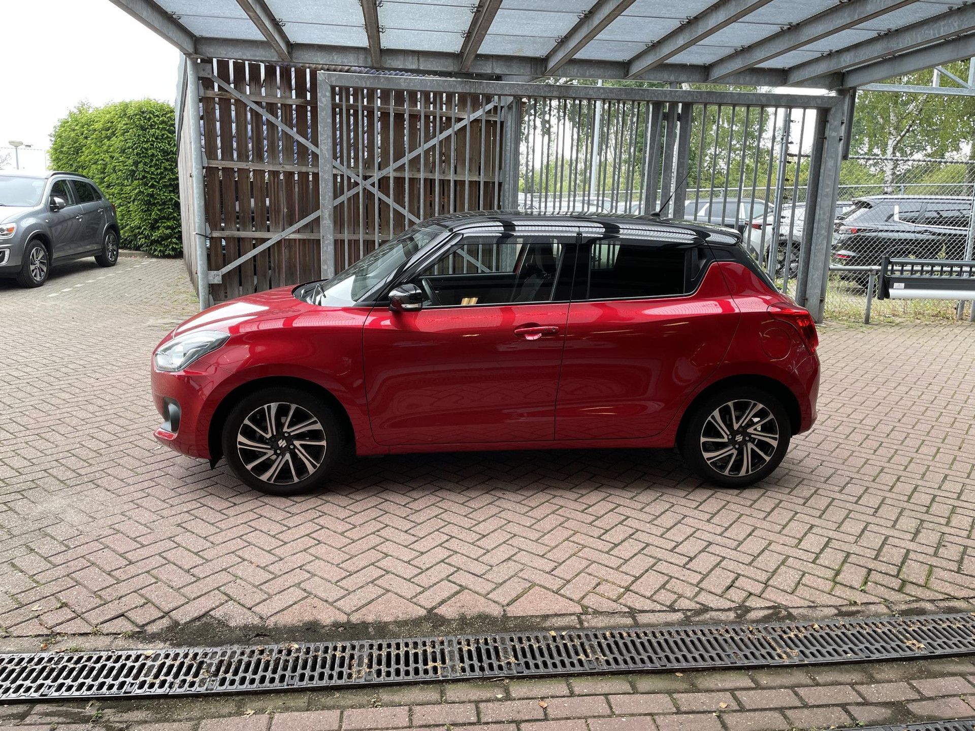 Suzuki Swift met kenteken HDD-62-X – achteraanzicht
