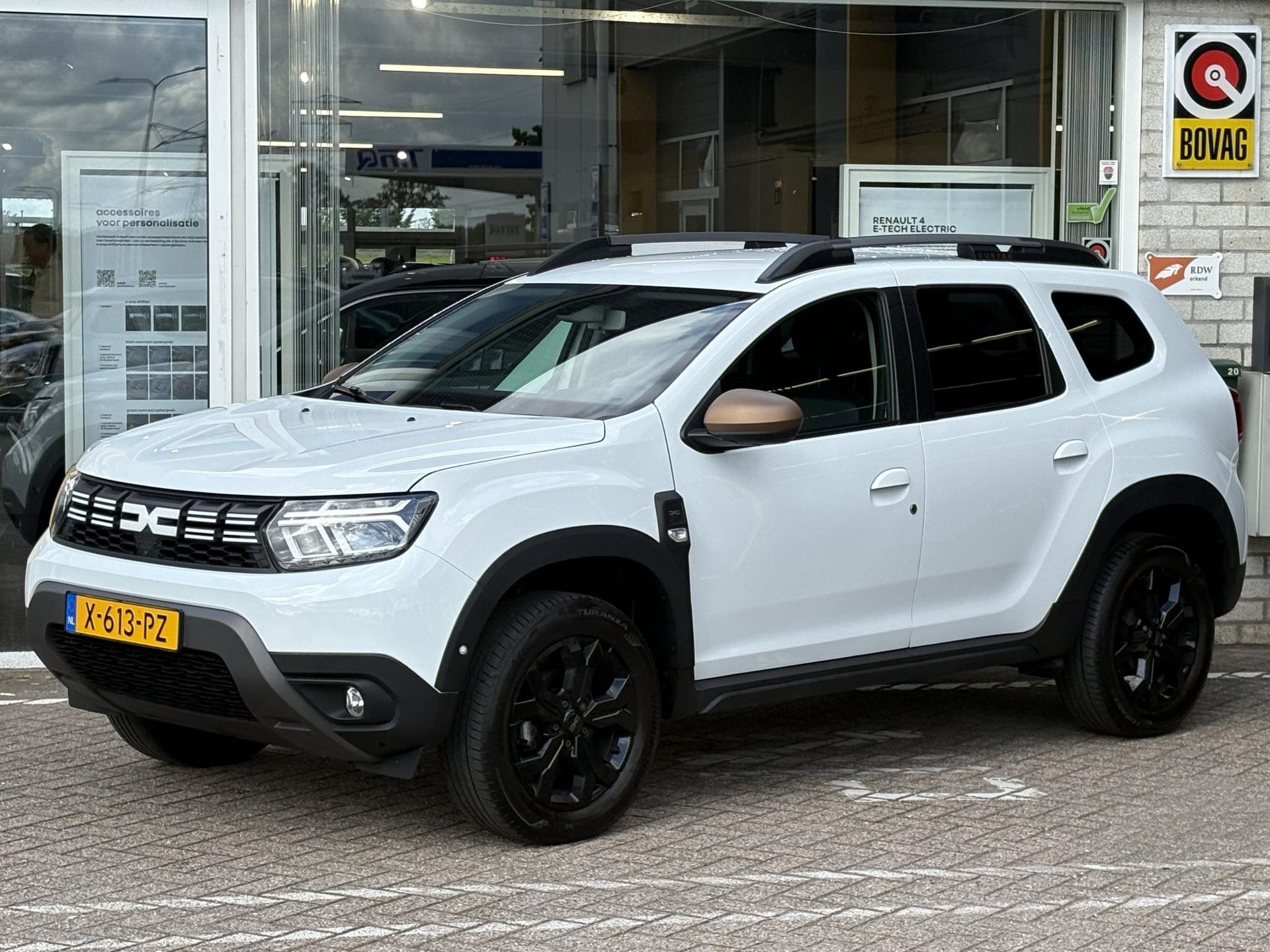 Dacia Duster met kenteken X-613-PZ – autofoto 2