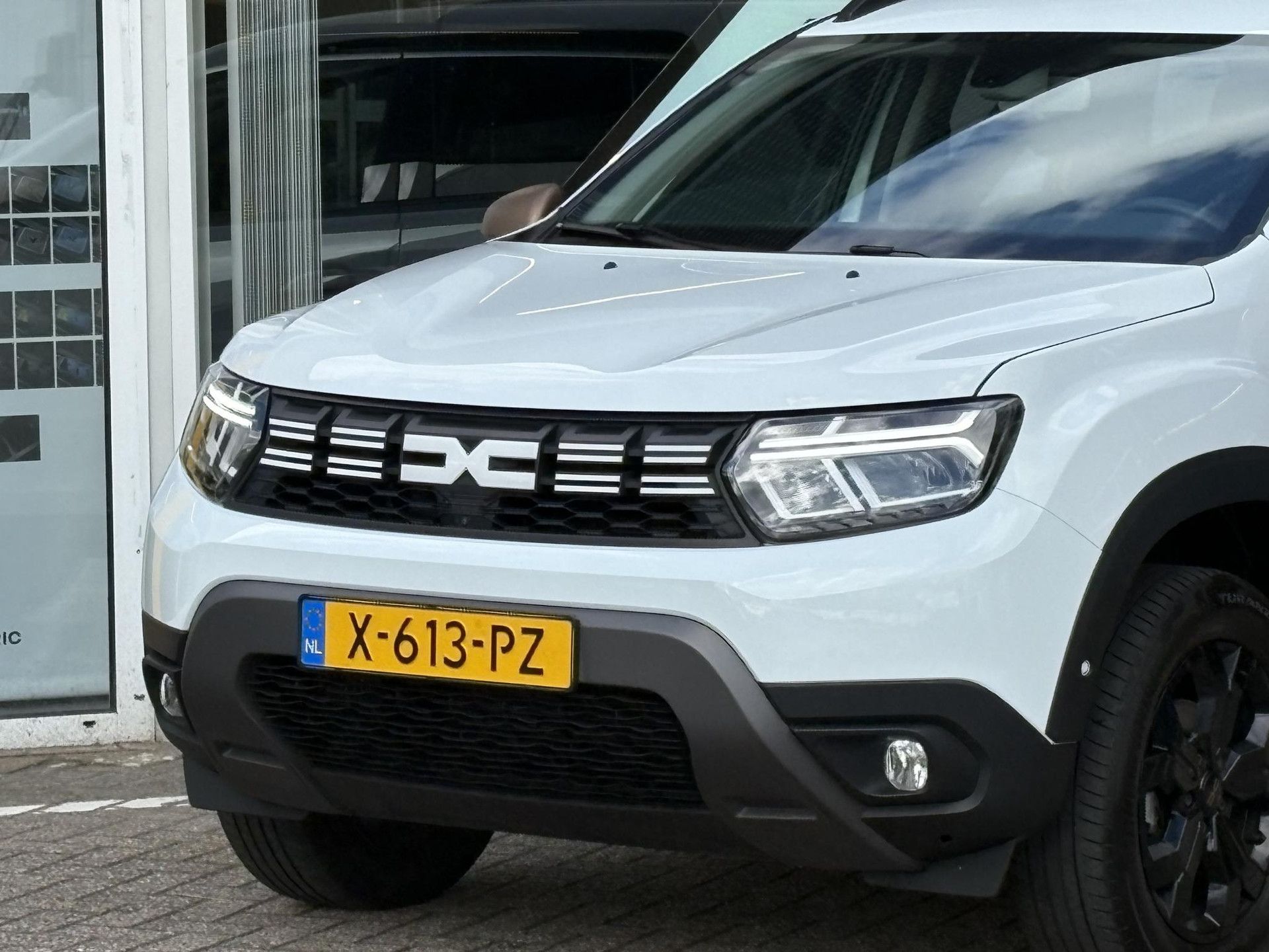 Dacia Duster met kenteken X-613-PZ – autofoto 5