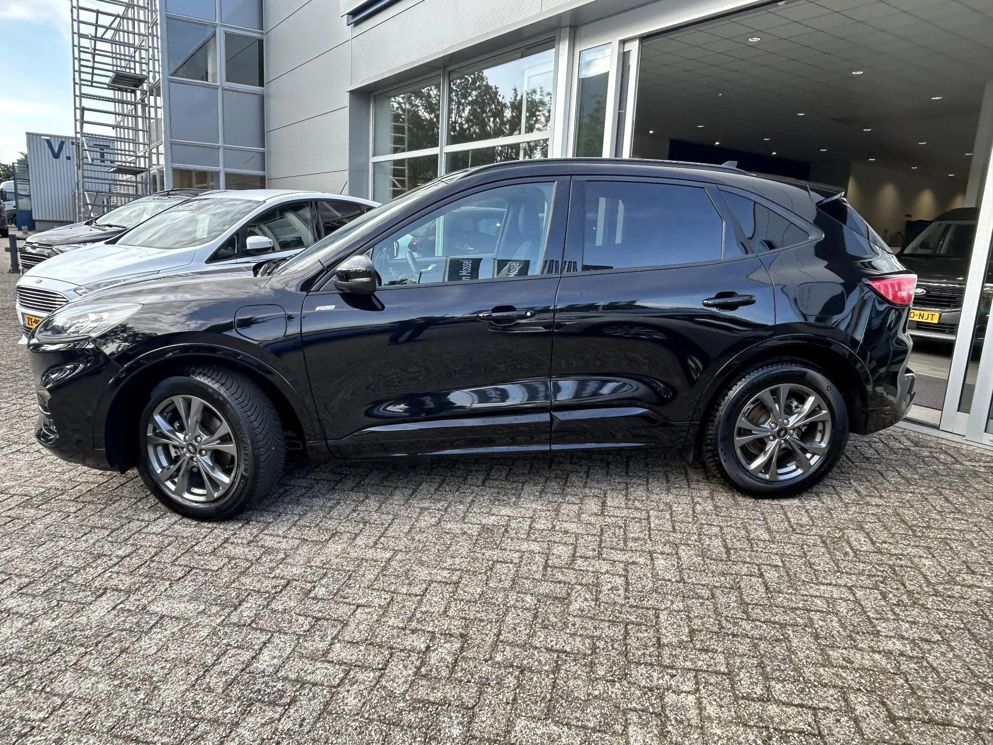 Ford Kuga met kenteken 14100 – autofoto 4