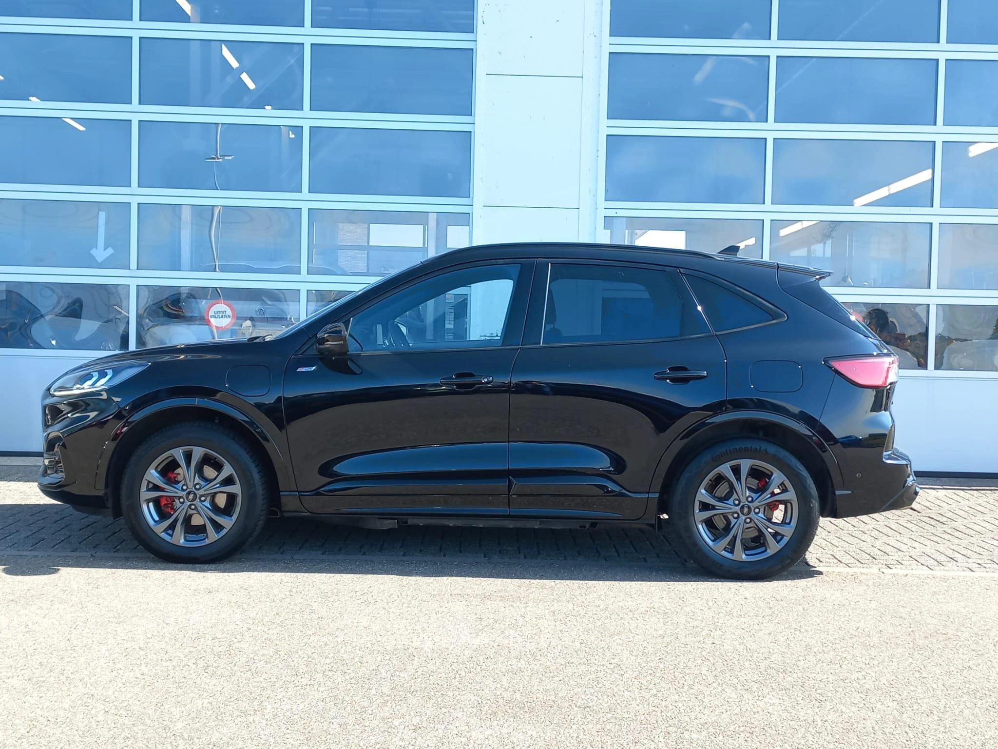 Ford Kuga met kenteken 56 – autofoto 3