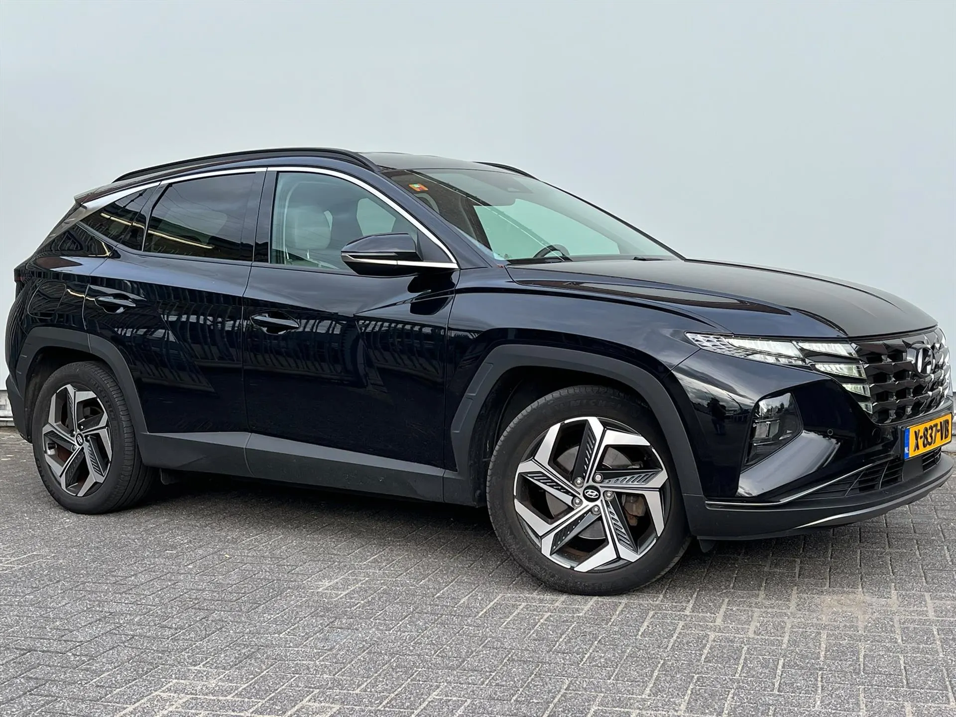 Hyundai Tucson met kenteken X-837-VB – autofoto 3