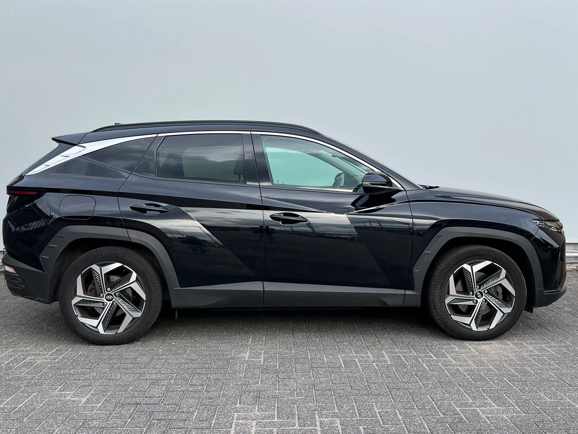 Hyundai Tucson met kenteken X-837-VB – autofoto 5
