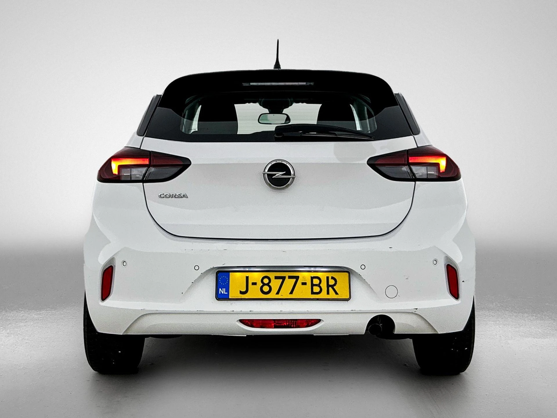 Opel Corsa met kenteken 43100 – autofoto 5