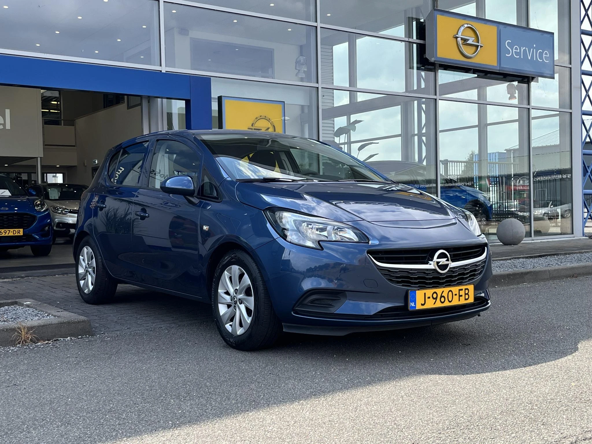 Opel Corsa met kenteken 67100 – autofoto 5